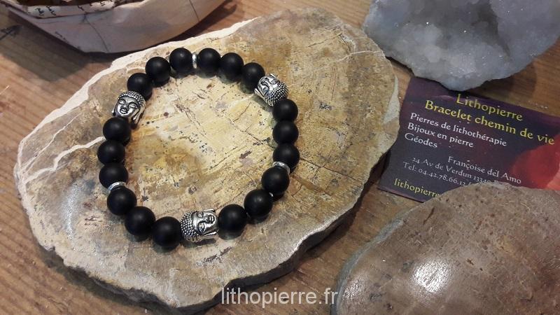 Pierres de lithothérapie: Bracelet en onyx en perles avec 3 boudhas